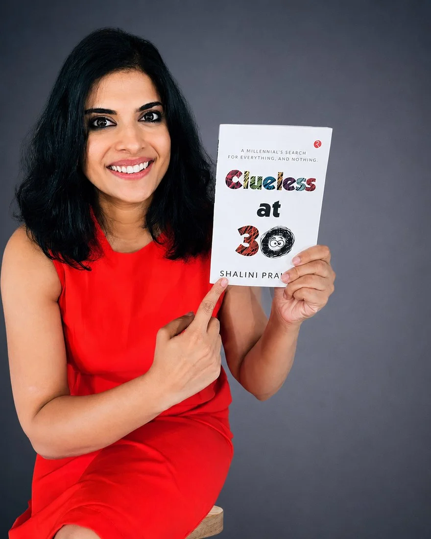 Shalini Prakash holding her book, Clueless at 30